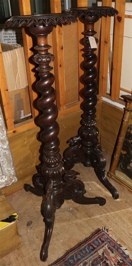 Pair of Victorian carved oak torcheres
